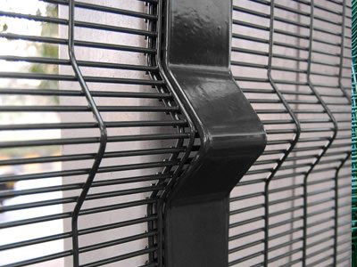 Extra high security fence made from black  V bends 358 mesh panels.