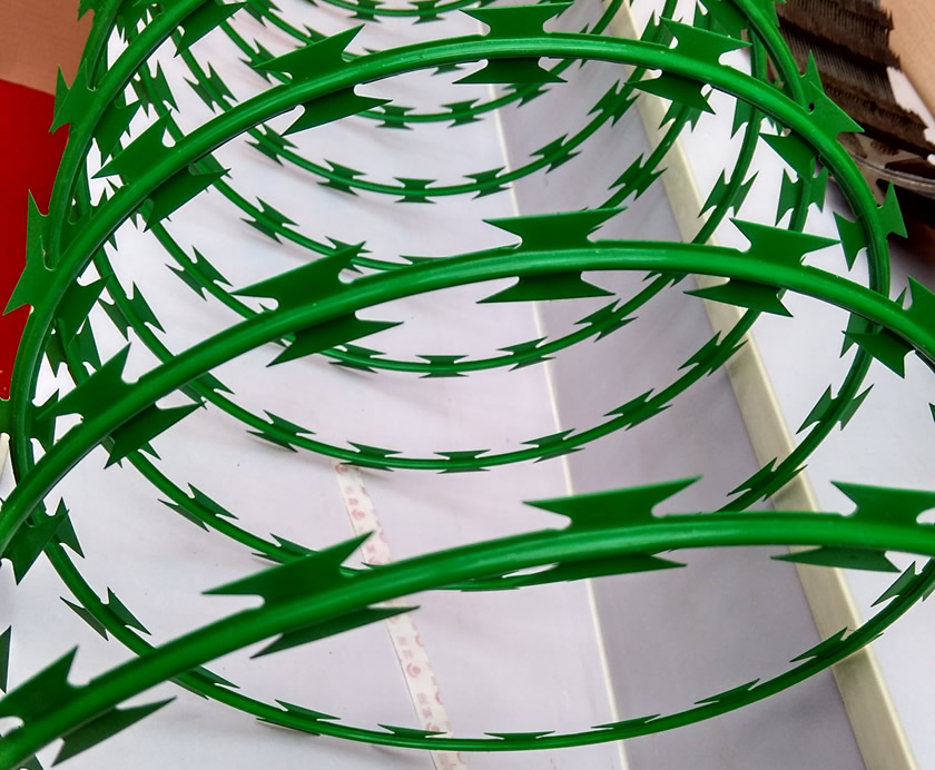A coil of concertina razor wire on our factory showroom.